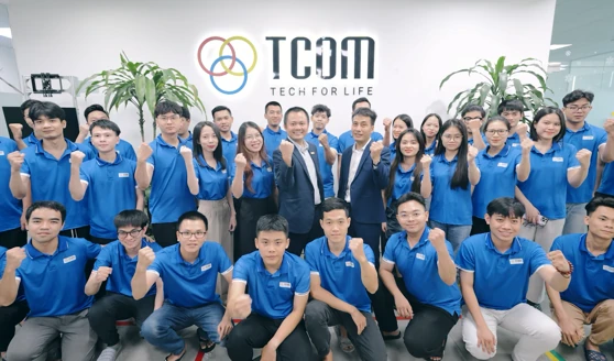 TCOM CORPORATION team photo 1